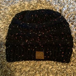 CC Beanie black w/ a popcorn like pattern orange green yellow w/ pony tail hole